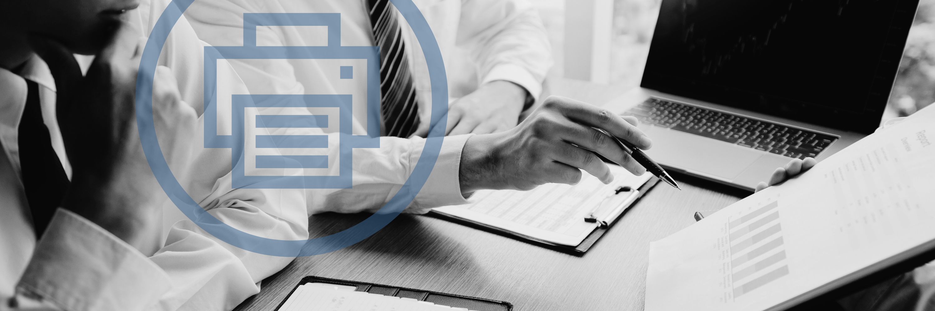 Businessmen discussing on a table with laptop and papers