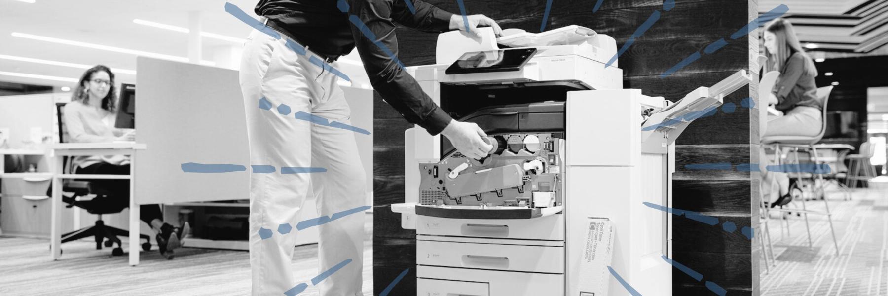 Man replacing toner on a laser printer