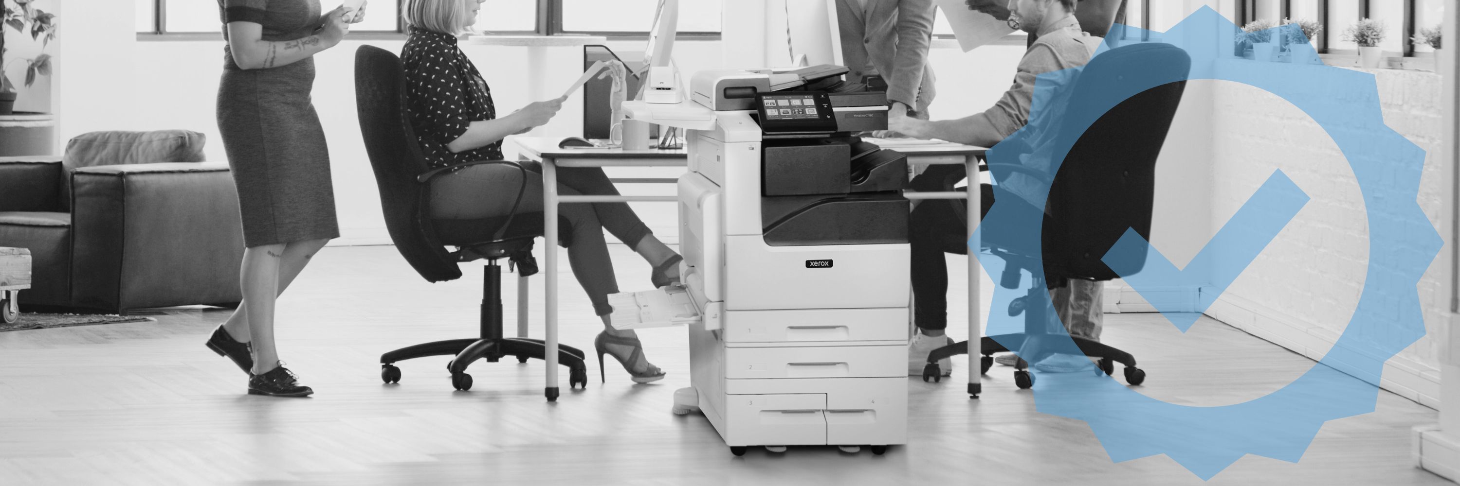 Workgroup working behing a Xerox VersaLink C7125 printer