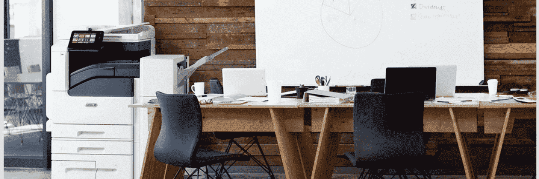 Workplace with desks next to the Xerox VersaLink B7035