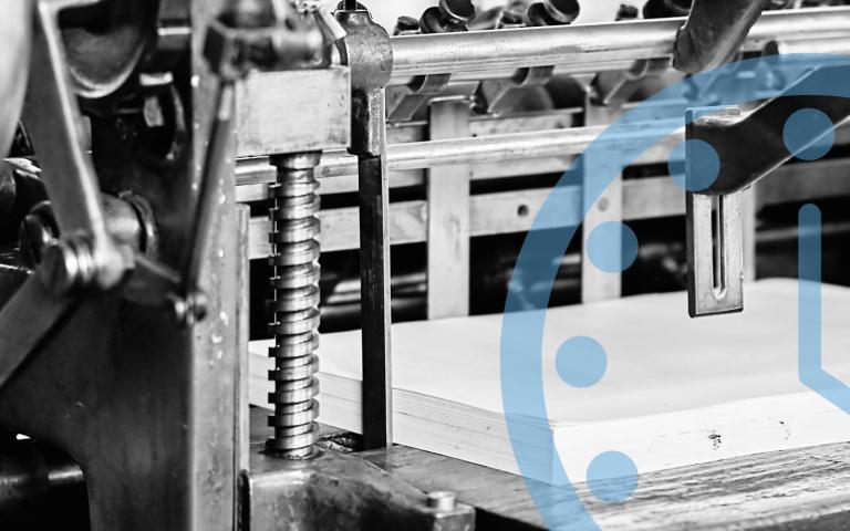 An old printing press with a graphic overlay of a clock