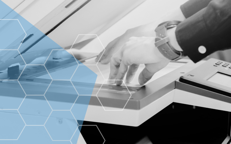 Printer with blue background.