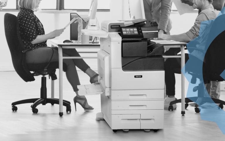 Workgroup working behing a Xerox VersaLink C7125 printer
