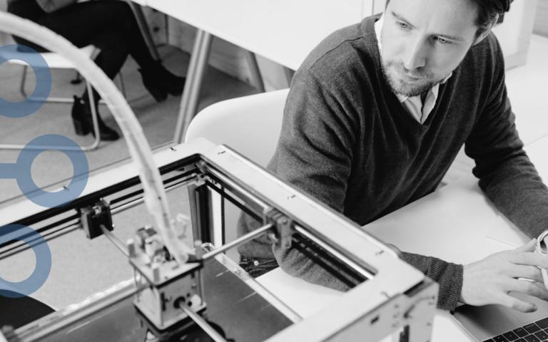 A man using a 3D printer