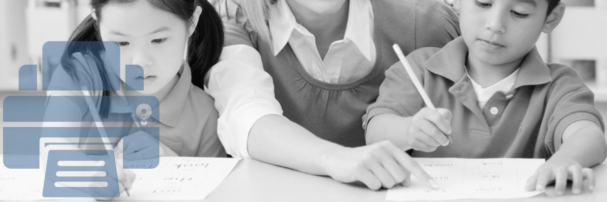 A teacher helping students with paperwork