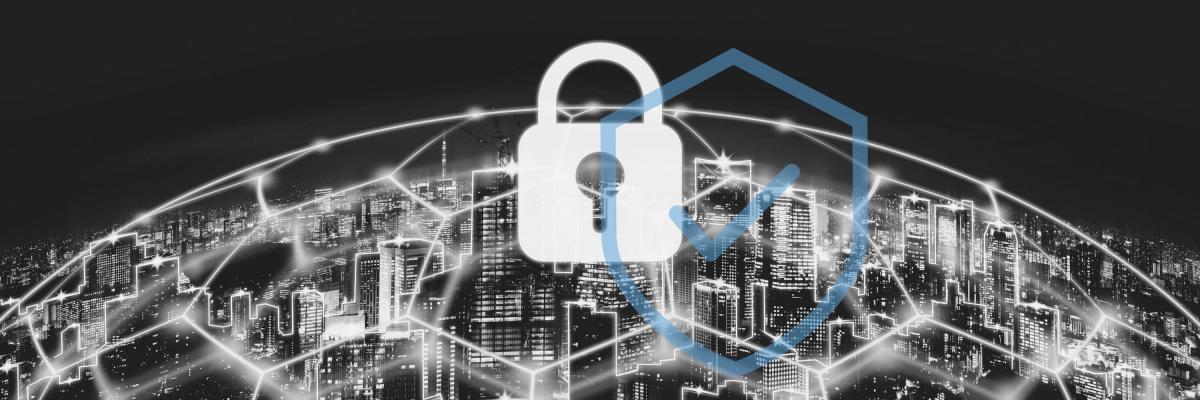 A city network is protected by a barrier with a white lock on top of it.