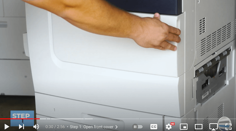Printer technician opens the front cover on the Xerox PrimeLink C9065
