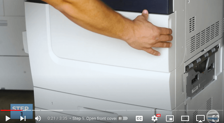 Printer technician opens the front cover on the Xerox PrimeLink C9065