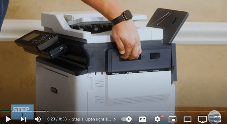 Printer technician lifts the right side cover to access imaging kit of the Xerox C315 printer
