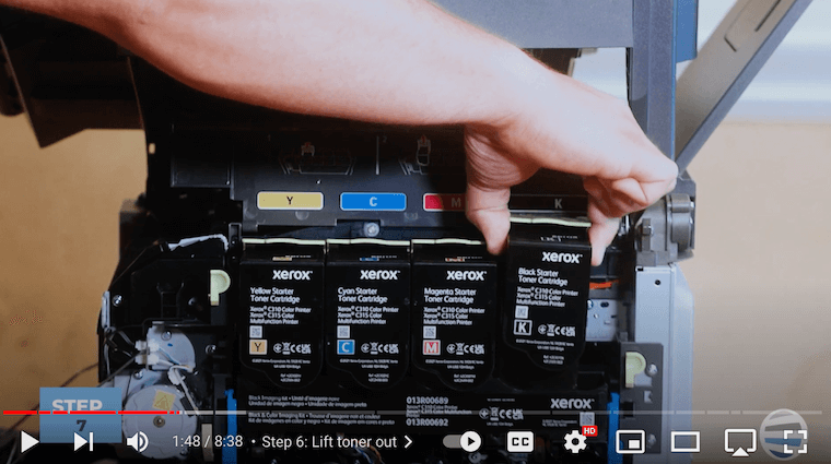 Printer technician removes toners of the Xerox C315 printer