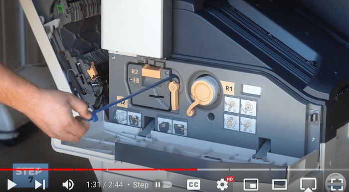 Printer technician cleans the LED Light Array on the Xerox AltaLink B8090 Printer