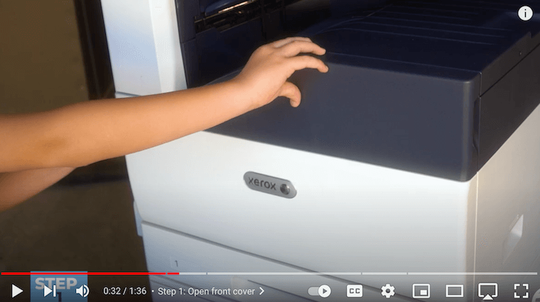 Printer technician opens the front cover on the Xerox VersaLink C7030