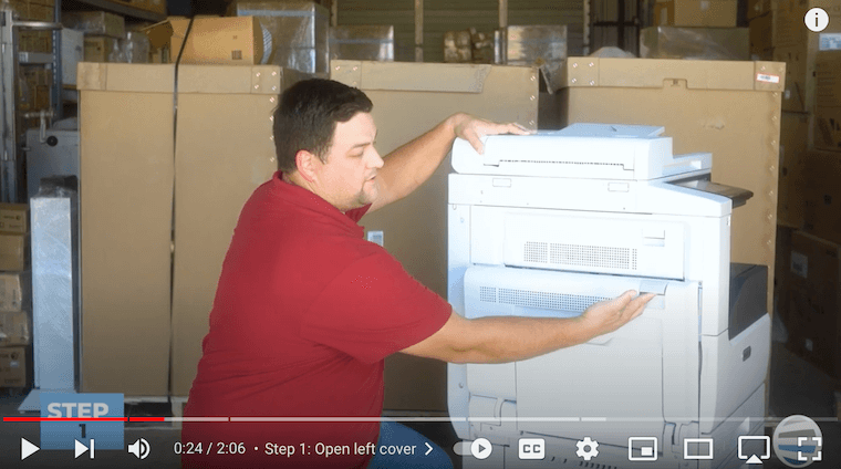 Printer technician opens the left cover on the Xerox VersaLink C7030