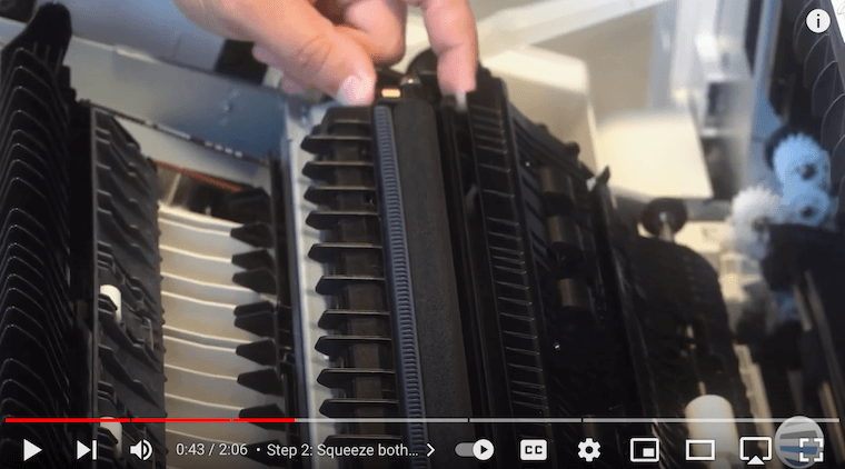 Printer technician releases the old BTR on the Xerox VersaLink C7030