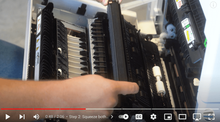 Printer technician opens pulls out the old BTR on the Xerox VersaLink C7030