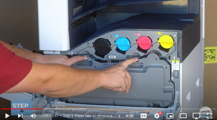 Printer technician removes the waste cartridge on Xerox VersaLink C7020/C7025/C7030
