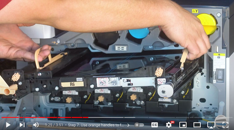 Printer technician fully removes transfer belt assembly on Xerox VersaLink C7020/C7025/C7030