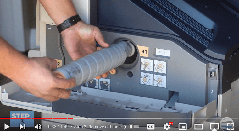 Printer technician removes the old toner on the Xerox AltaLink B8090 Printer