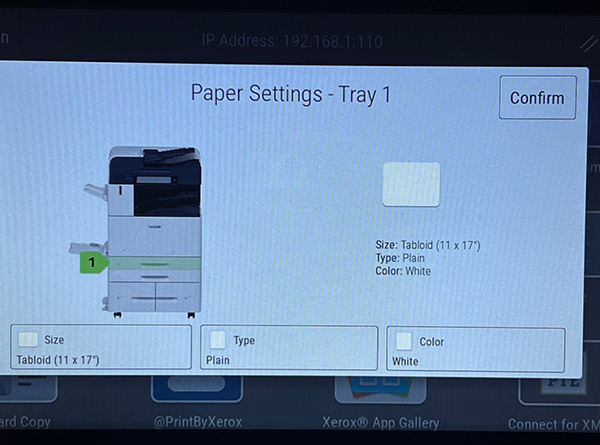 A prompt from a printer asking the user to input the correct papers size, type, and color